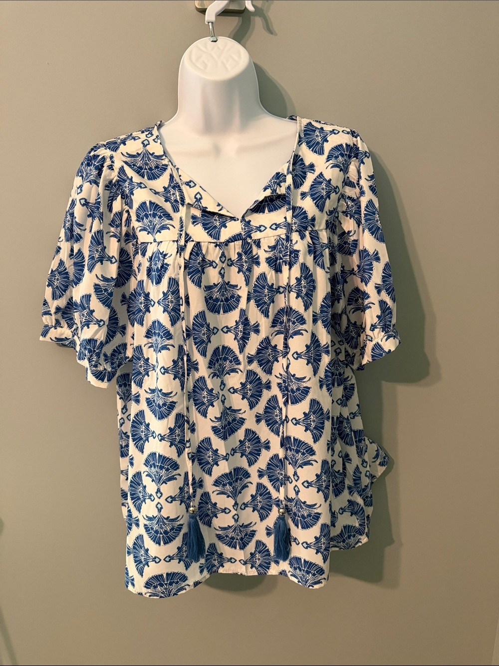 Blue and white blouse.